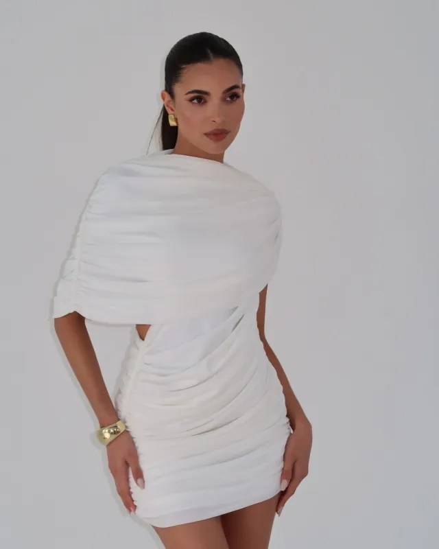 White draped shoulder mini dress sold by Heiress Beverly Hills