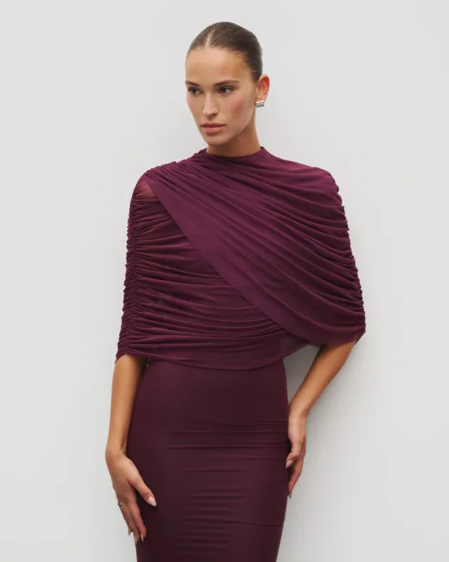 The Sheer Cape sold by Heiress Beverly Hills