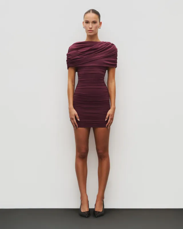 The Draped Shoulder Mini Dress sold by Heiress Beverly Hills