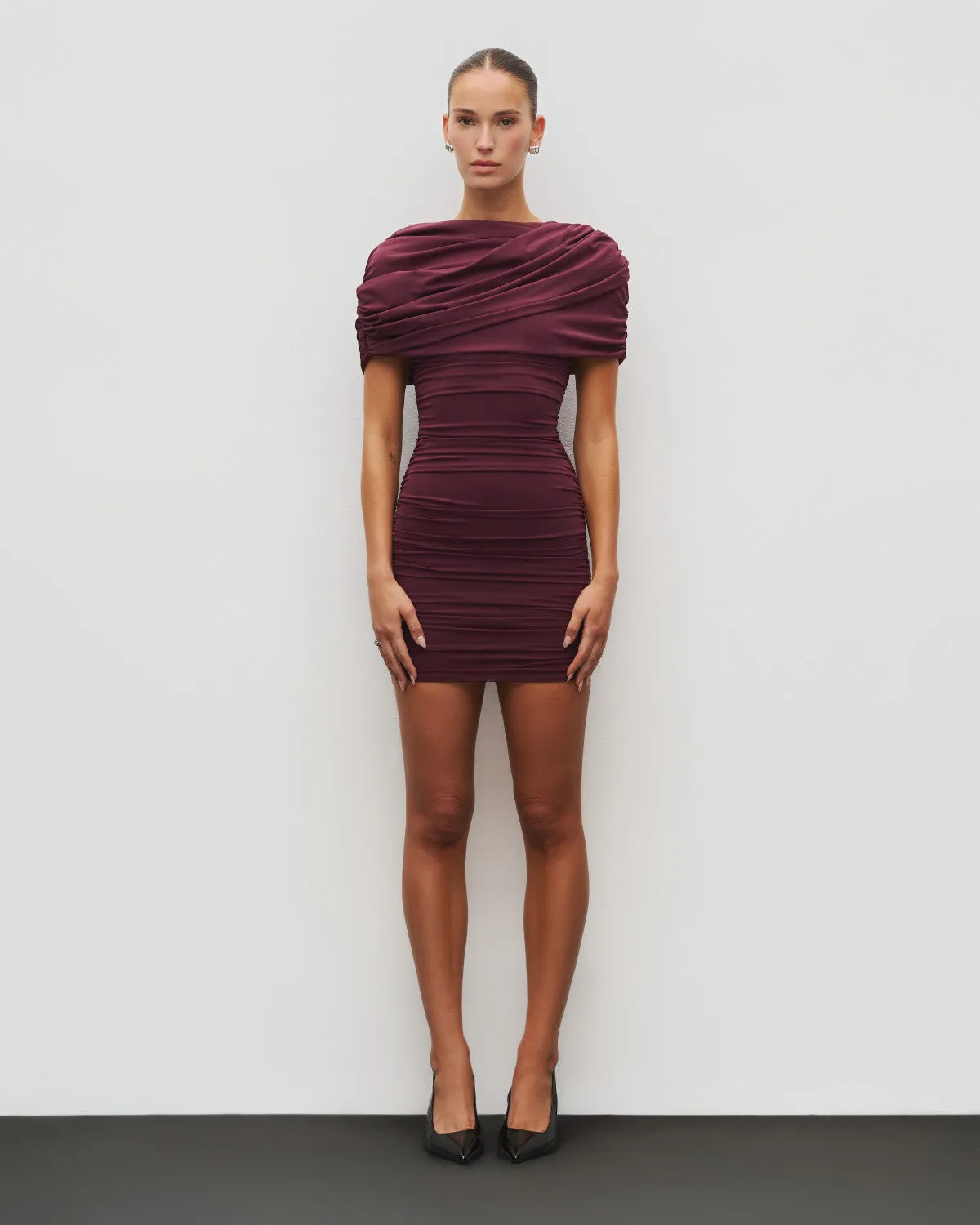 The Draped Shoulder Mini Dress sold by Heiress Beverly Hills