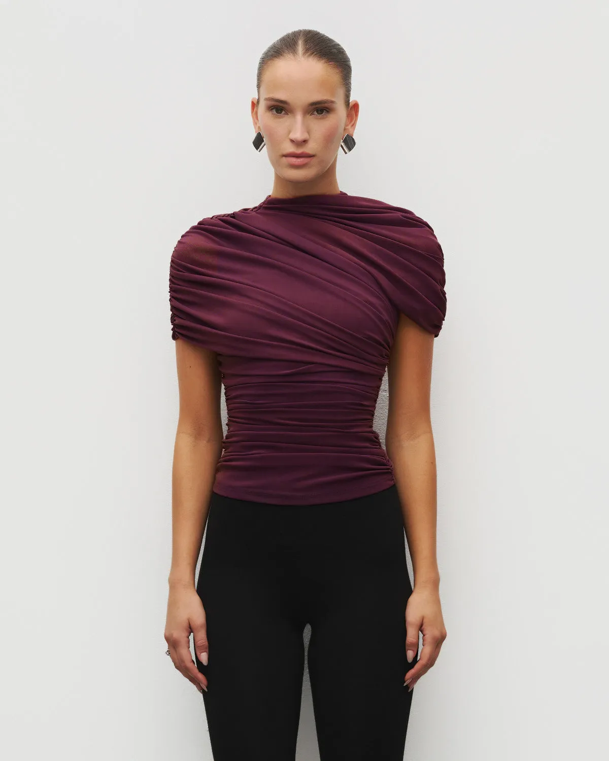 The Draped Shoulder Top sold by Heiress Beverly Hills