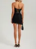 Black lace mesh corset drape mini dress sold by Heiress Beverly Hills