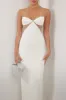 White diamante strap cutout maxi dress sold by Heiress Beverly Hills