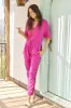 The Caroline Jumpsuit in Fuchsia sold by La Peony Clothing