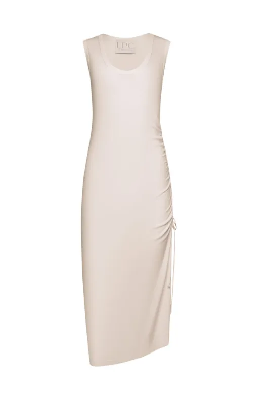 The Jessi Dress in Sugar Swizzle (off-white) sold by La Peony Clothing