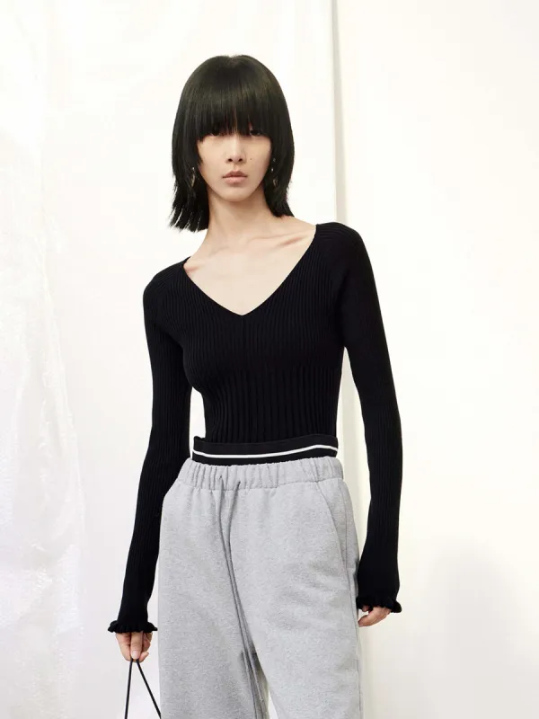 Ruffle Trims Ribbed Knit Sweater sold by Mo&Co