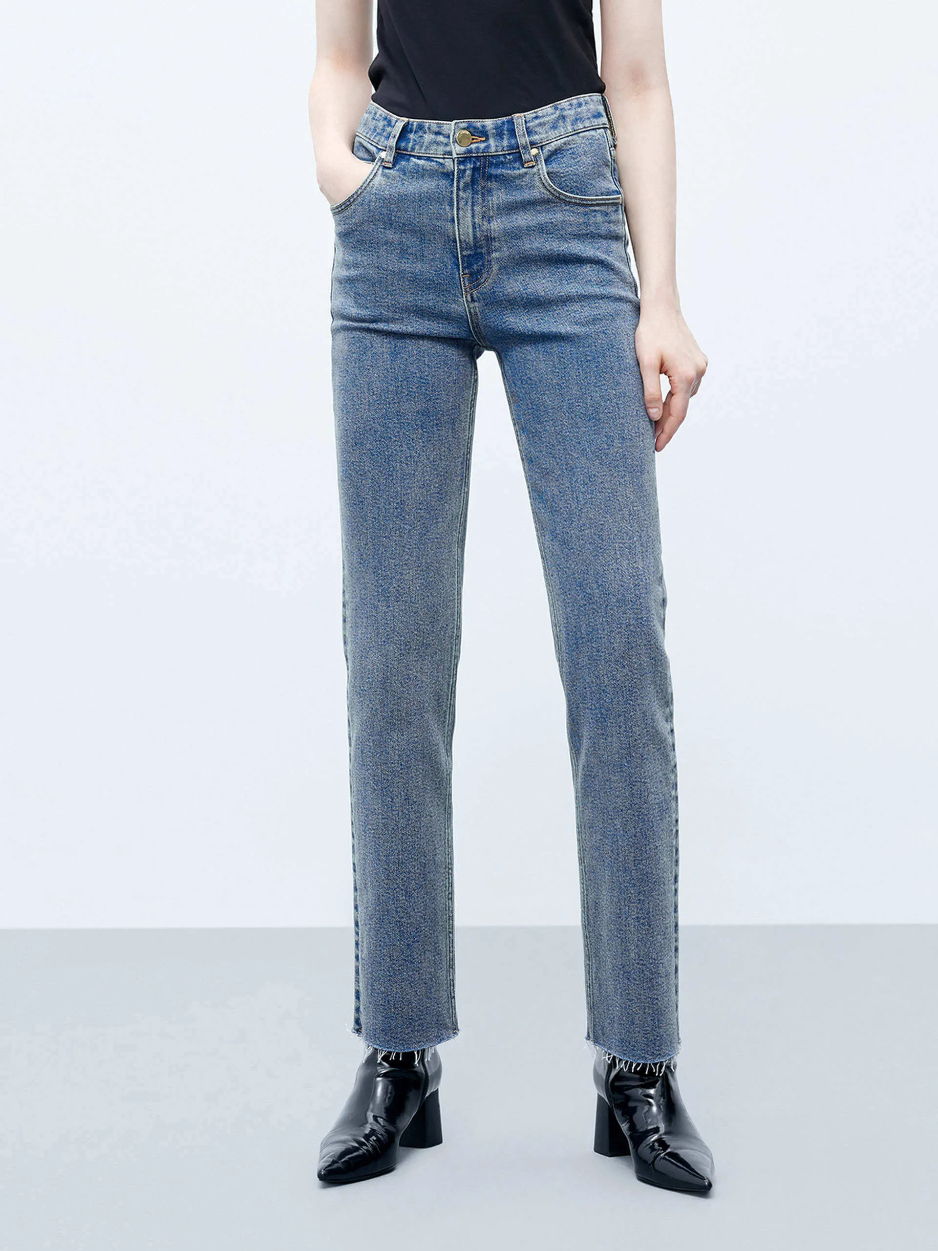 Straight Leg Raw Hem Jeans sold by Mo&Co
