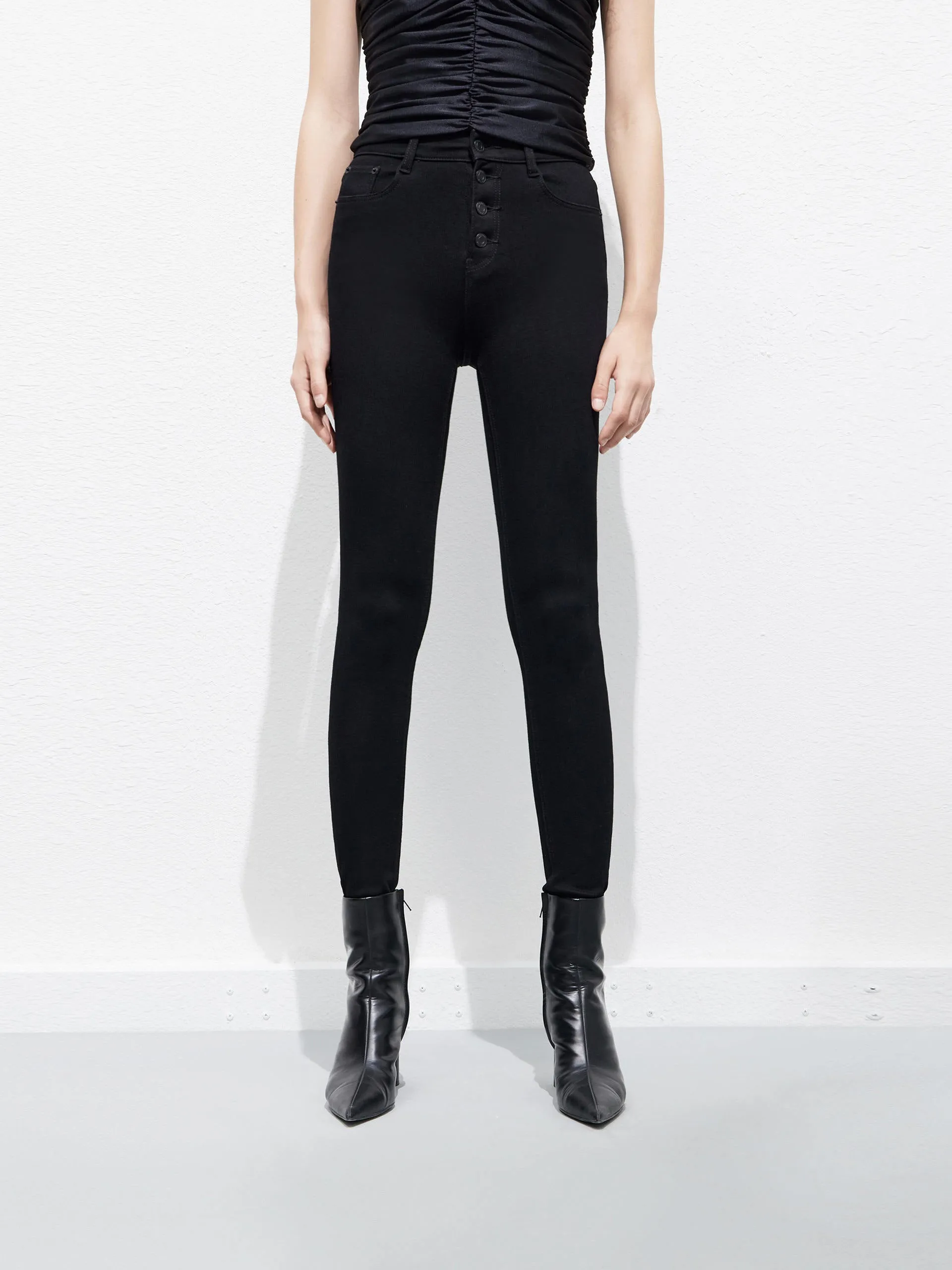 Slit High Rise Jeans in Skinny sold by Mo&Co