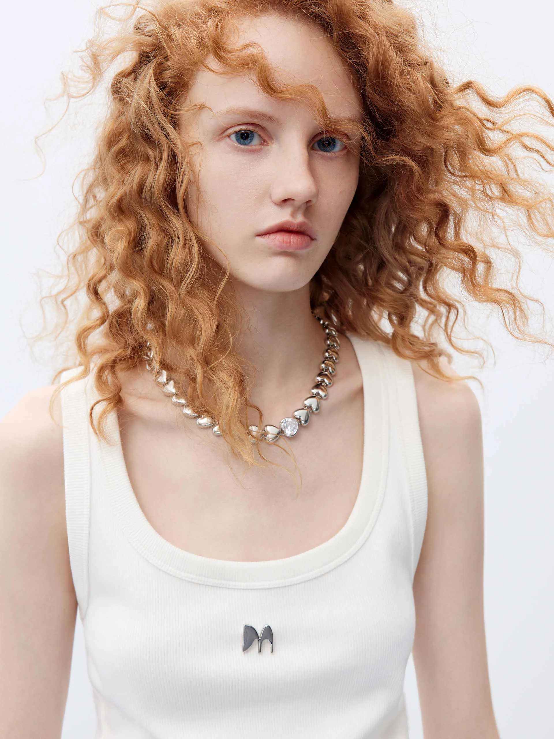 Metal M Detail Ribbed Tank Top sold by Mo&Co