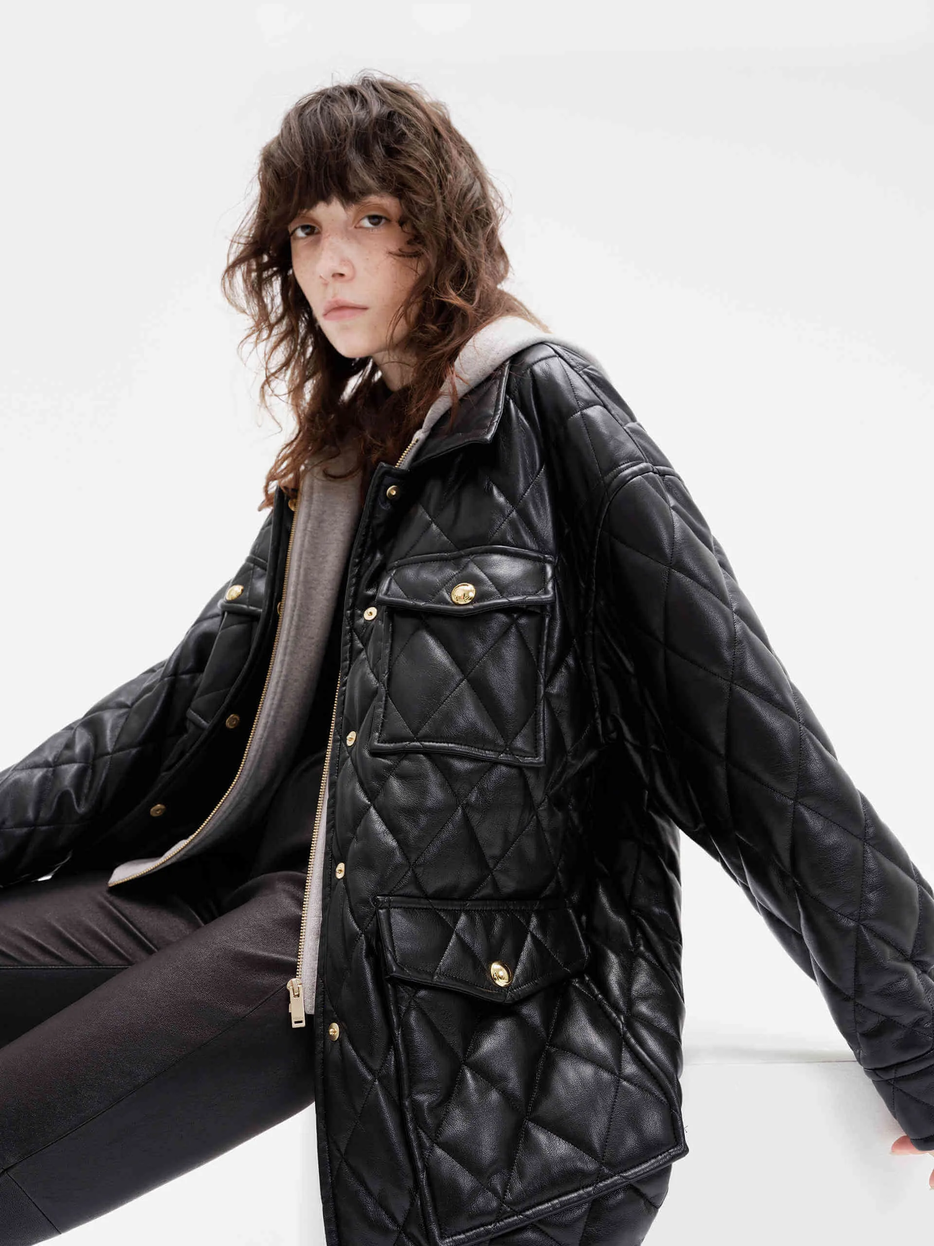 Layered PU Leather Quilted Jacket sold by Mo&Co product image thumbnail 4