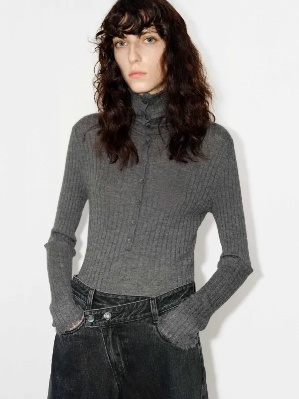 Half Button Turtleneck Top sold by Mo&Co