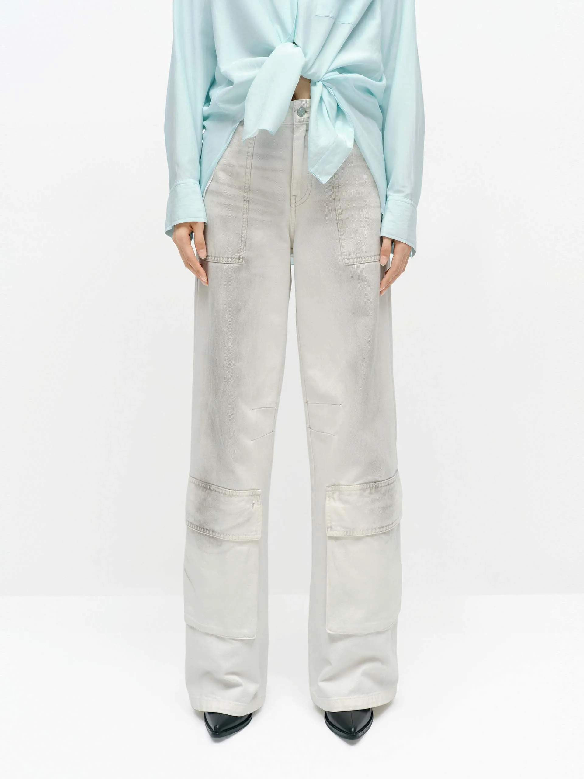 Sprayed Detail Cargo Jeans sold by Mo&Co