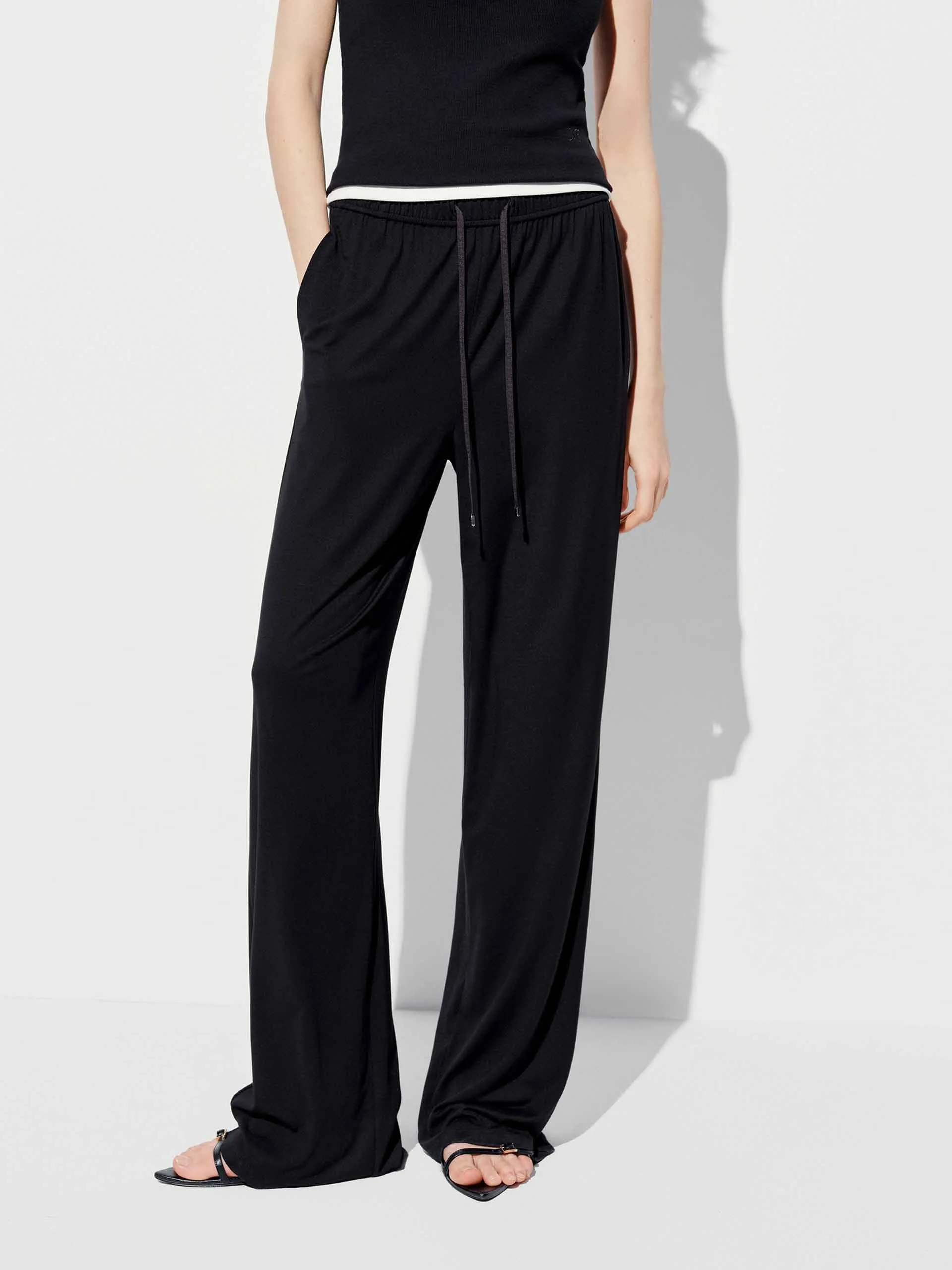 Side Pockets Drawstring Trousers sold by Mo&Co