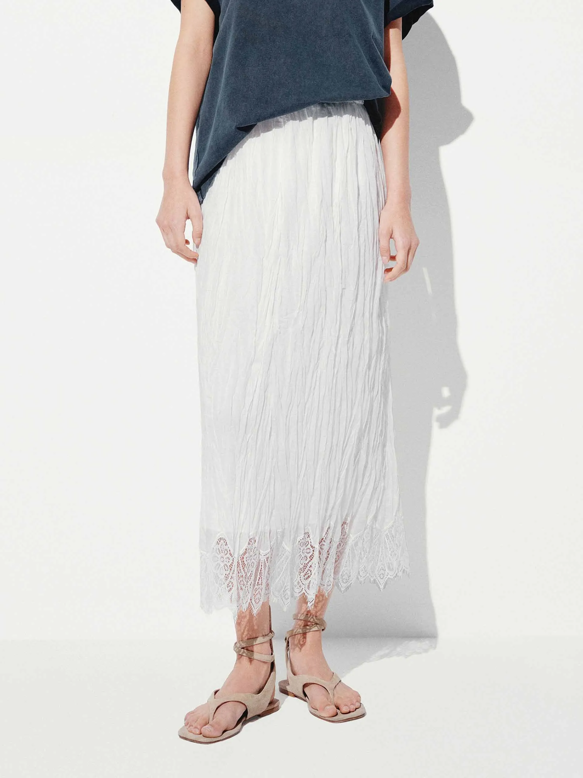 Lace-paneled Pleated Skirt sold by Mo&Co