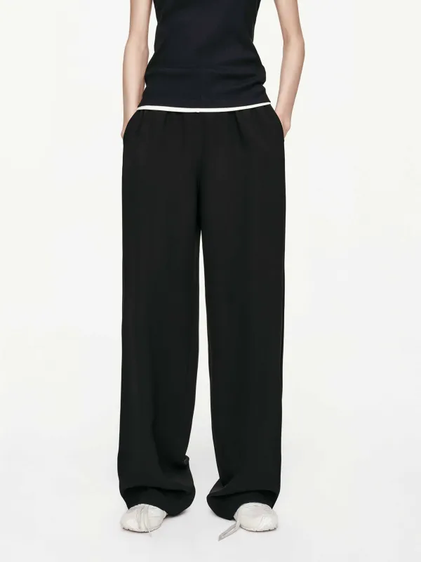 Black Relaxed Straight Trousers sold by Mo&Co