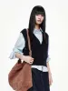 Deep V-neck Knit Vest sold by Mo&Co