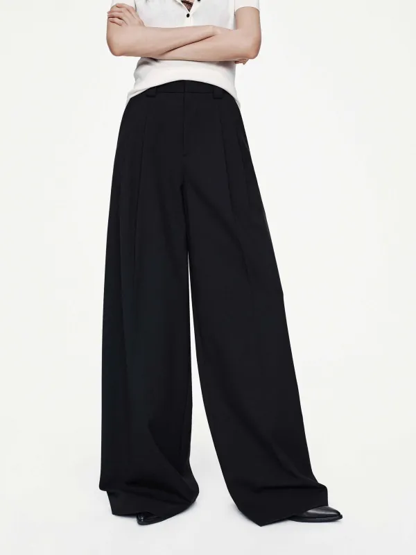 Pleated Relaxed Trousers sold by Mo&Co
