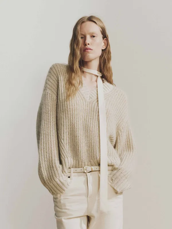 V-neck Raw Hem Sweater sold by Mo&Co