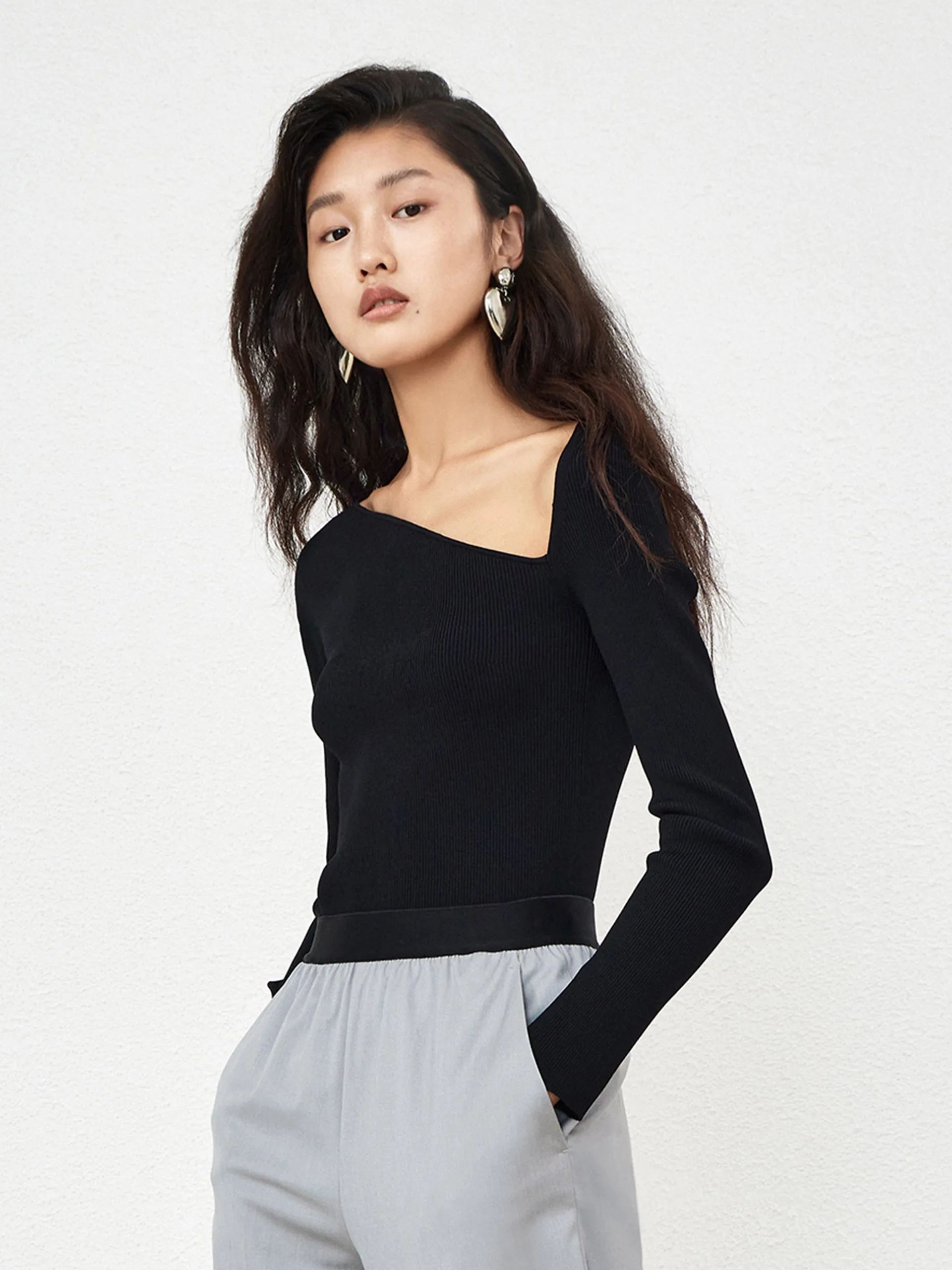 Stretch Slanted Collar Knit Top sold by Mo&Co