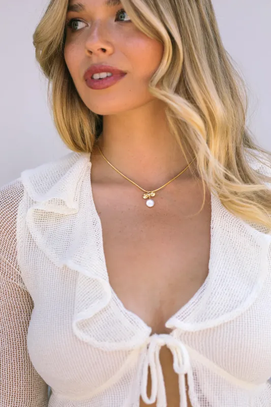 Dina Bow and Pearl Necklace sold by Morning Lavender