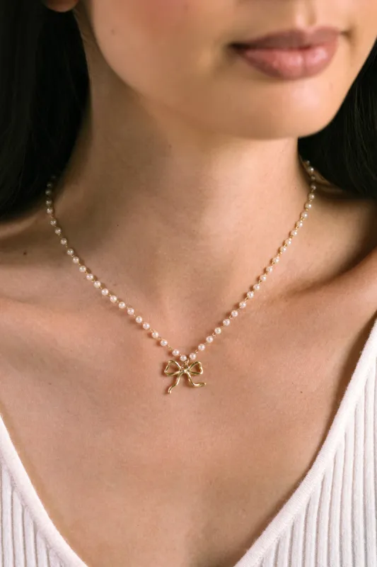 Sherry Pearl Chain with Bow Pendant Necklace sold by Morning Lavender