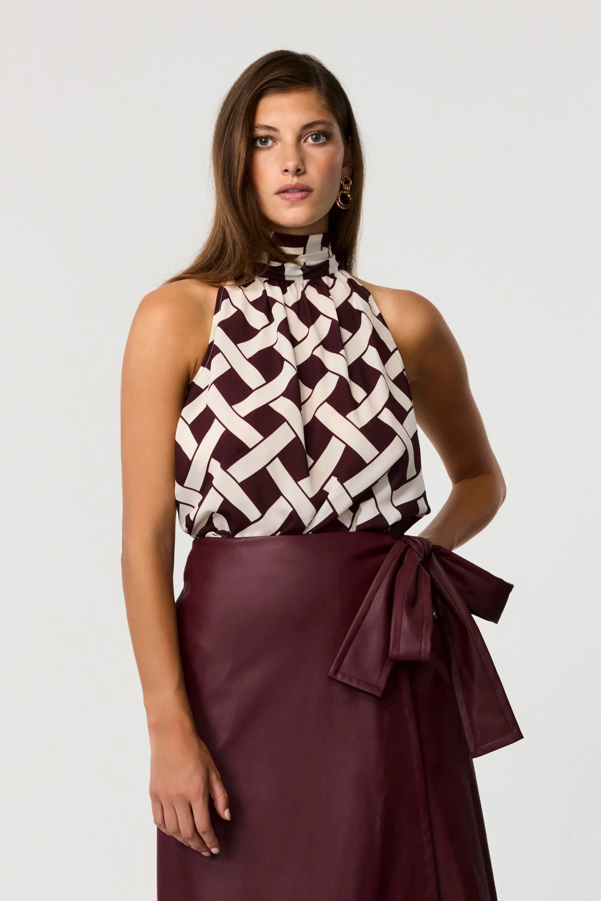 Hattie Sleeveless Tie-Neck Blouse sold by Toccin