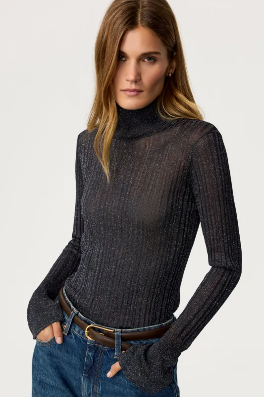 Amelia Turtle Neck Flared Long Sleeve Knit Top sold by Toccin