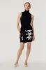 Jackie Houndstooth Knit Mini Skirt sold by Toccin