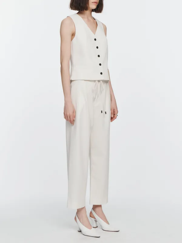 Pleat Front Drawstring Trouser in Ivory sold by MARIA McMANUS