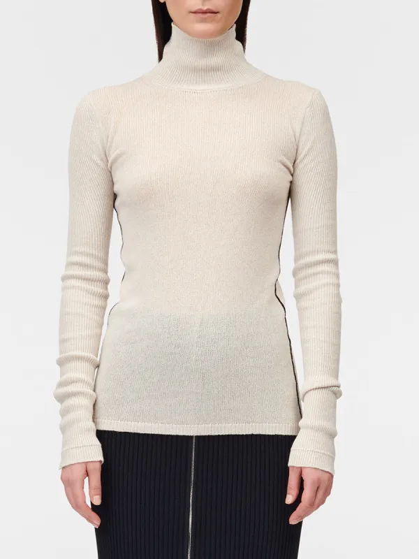 Ribbed Sleeve Turtle Neck in Crema sold by MARIA McMANUS