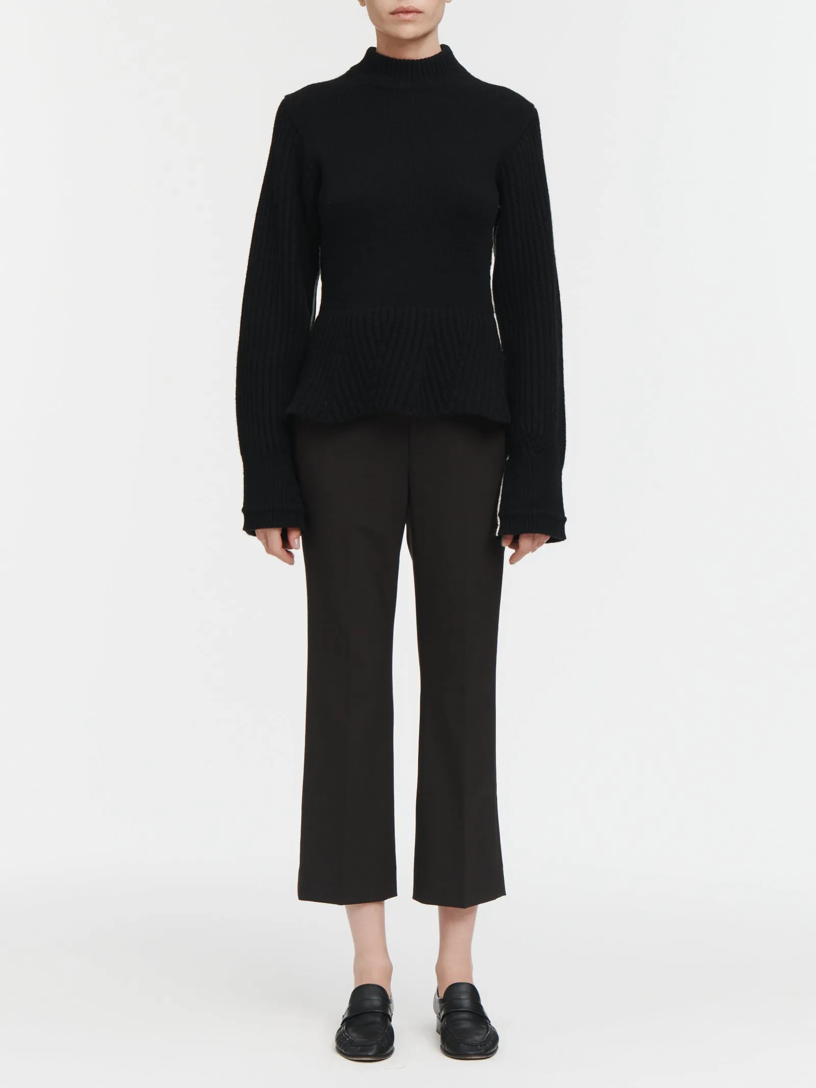 Peplum Mock Neck Sweater in Black sold by MARIA McMANUS