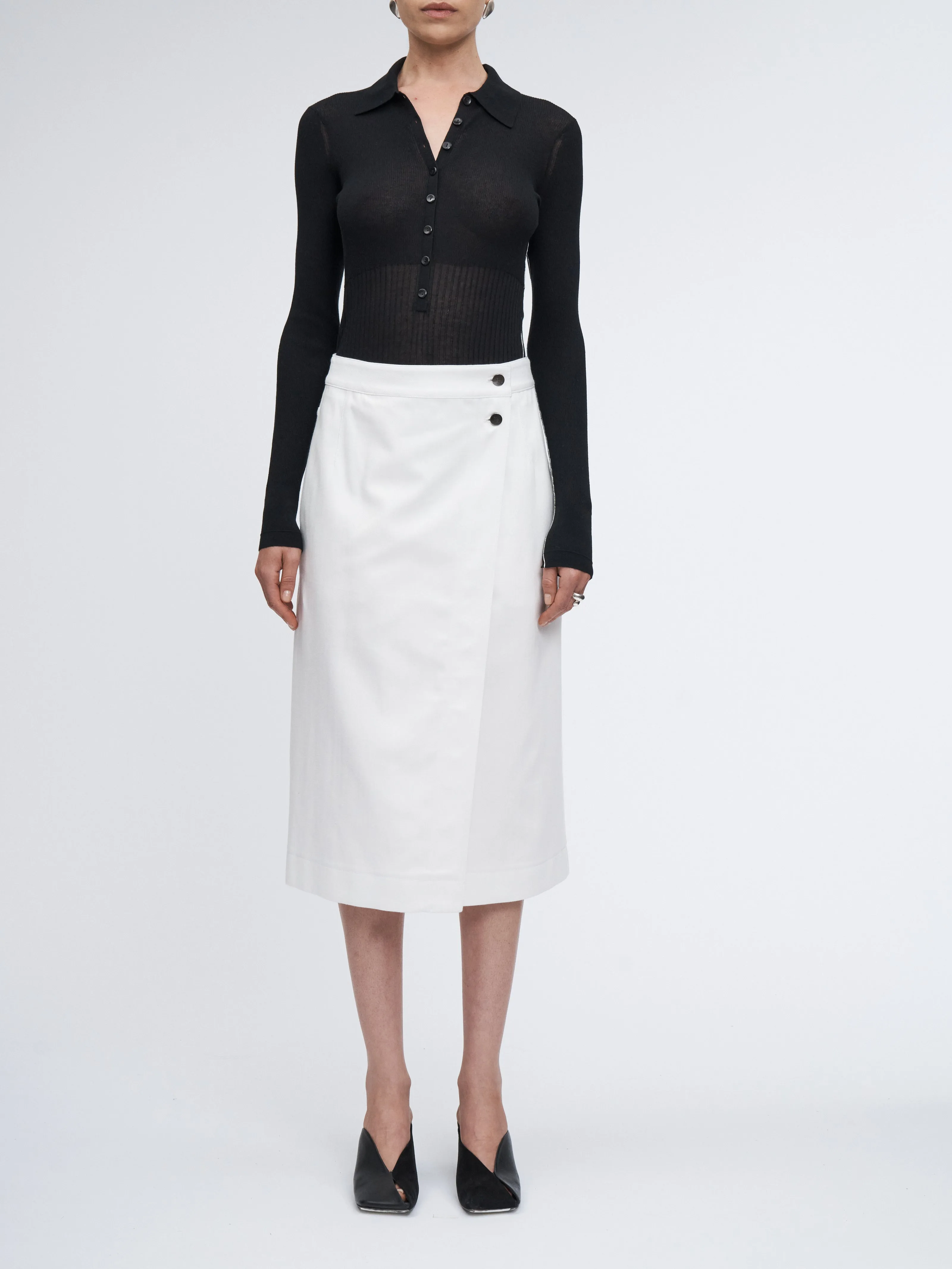 Ribbed Button Polo in Black sold by MARIA McMANUS