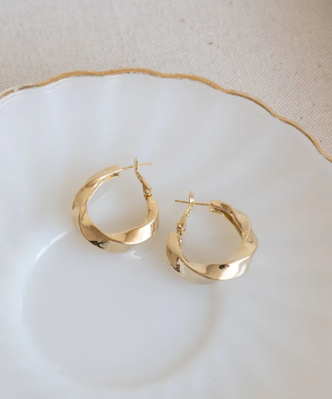 Medium Bold Twist Hoops made by AllynAllyn Inc.
