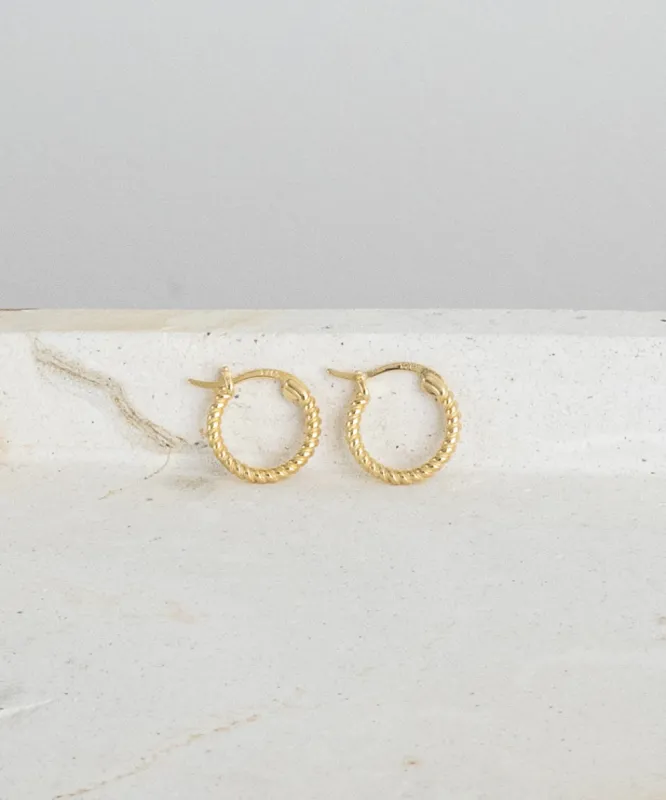 Mini Twist Huggie Hoops sold by AllynAllyn Inc.