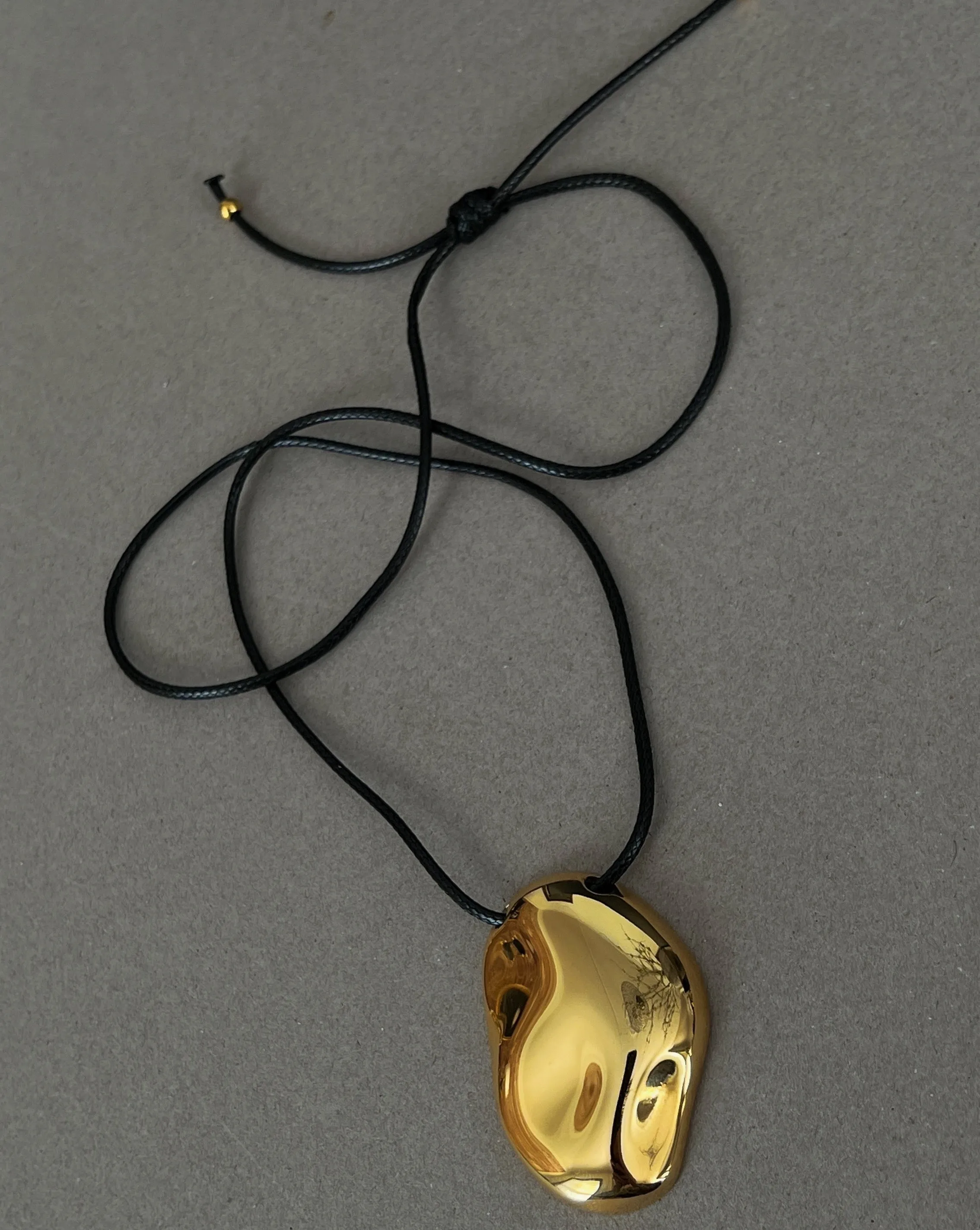 Ford Necklace -24k Gold sold by Banks Jewelry