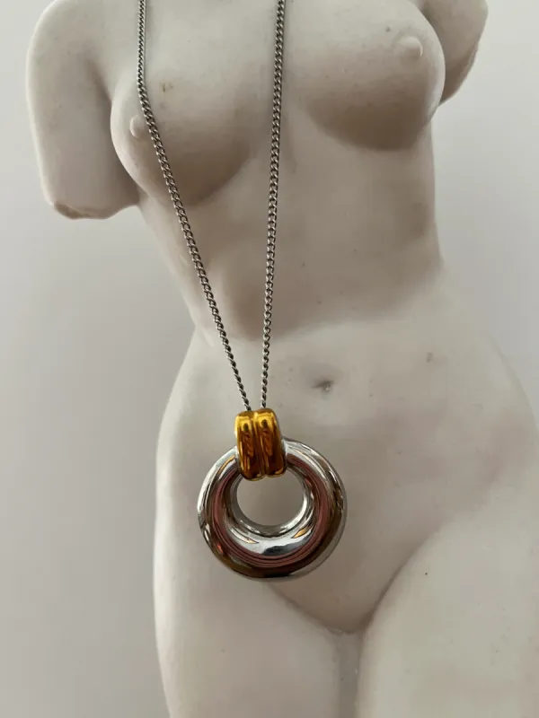 Mixed Metal Pendant Necklace sold by Banks Jewelry