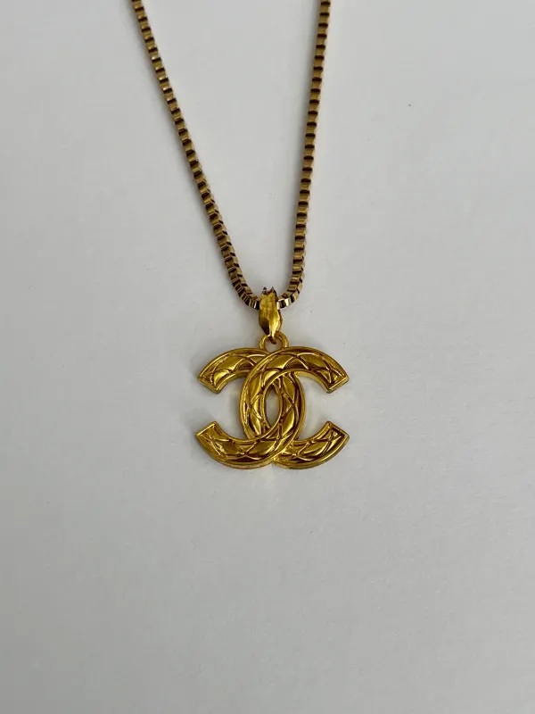 Chanel Charm Vintage Refurbished Designer Pendant Button necklace sold by Banks Jewelry