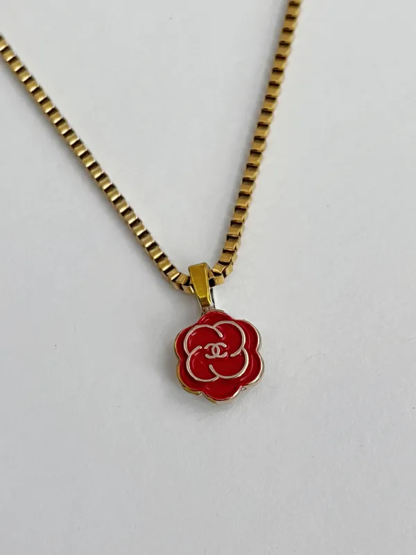 Mini Chanel Charm Vintage Refurbished Designer Pendant Button necklace sold by Banks Jewelry