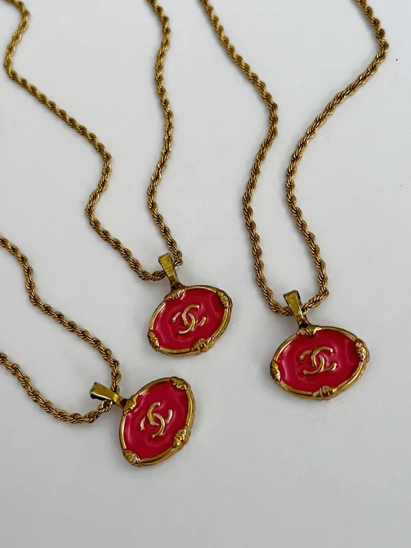 Pink Chanel Charm Vintage Refurbished Designer Pendant Button Necklace sold by Banks Jewelry