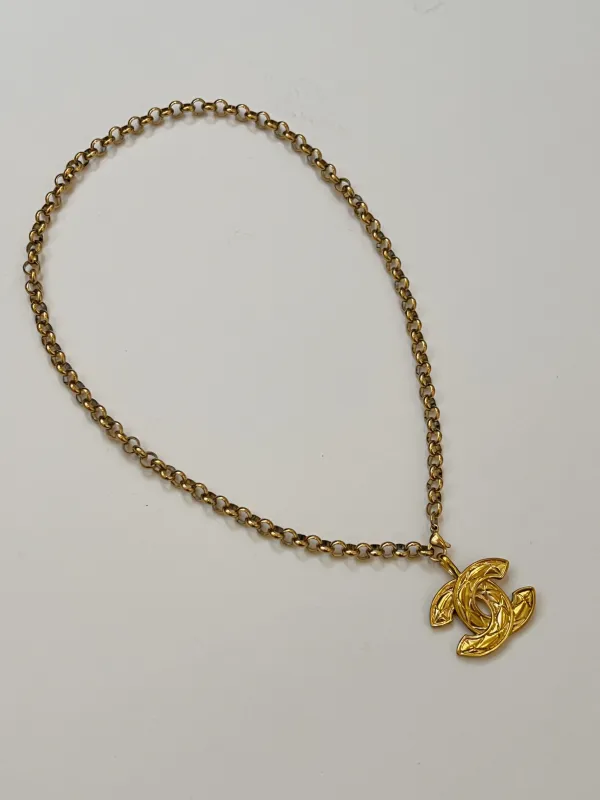 Chanel Charm Vintage Refurbished Designer Pendant Button necklace sold by Banks Jewelry