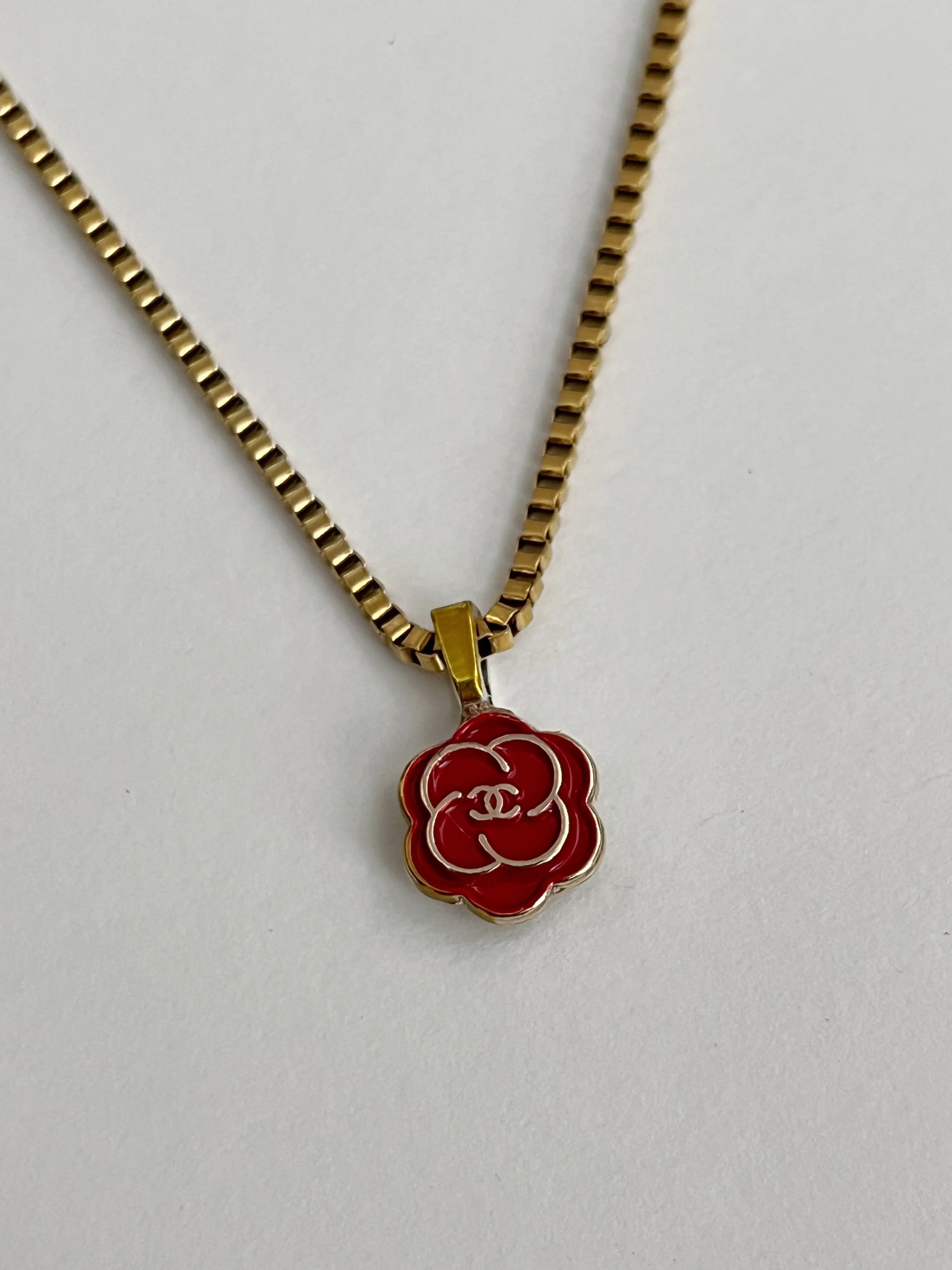 Chanel Charm Vintage Refurbished Designer Pendant Button necklace sold by Banks Jewelry