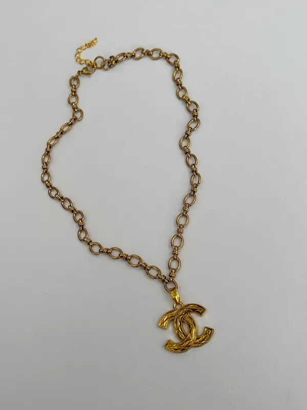 Chanel Charm Vintage Refurbished Designer Pendant Button necklace sold by Banks Jewelry