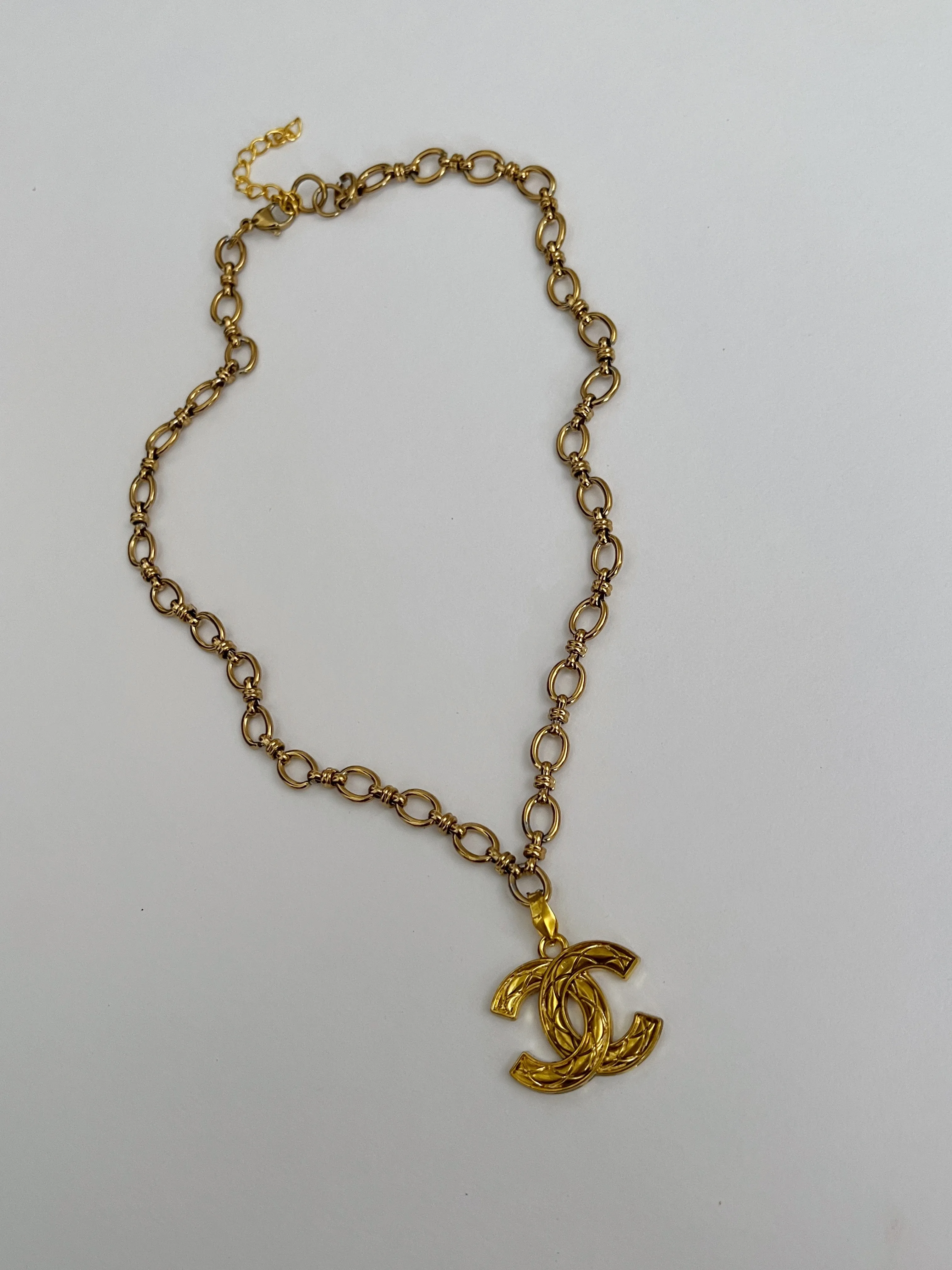 Chanel Charm Vintage Refurbished Designer Pendant Button necklace sold by Banks Jewelry
