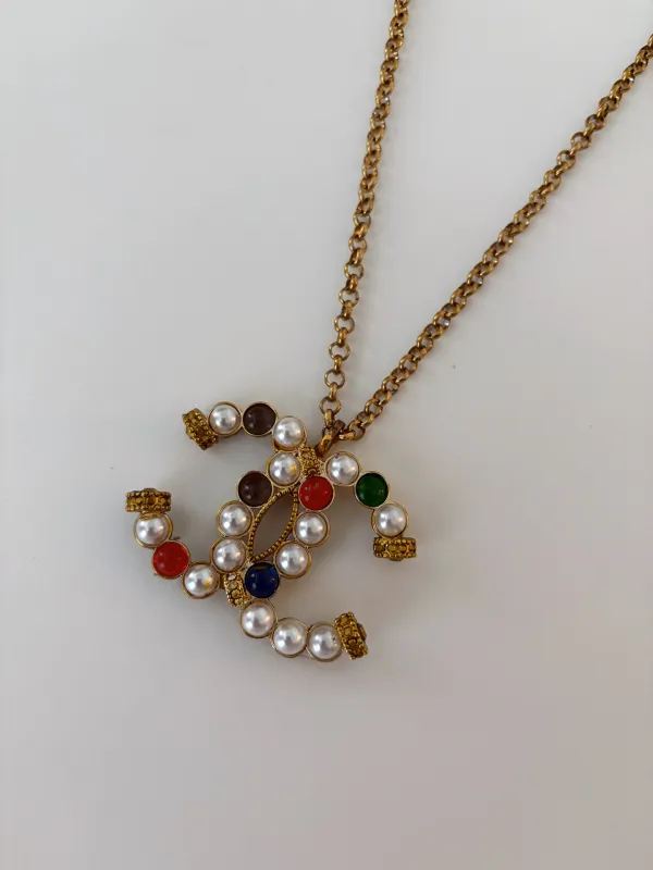 Chanel Charm Vintage Refurbished Designer Pendant Button necklace sold by Banks Jewelry