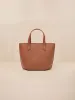 The Micro Expert Crossbody sold by BEE AND KIN