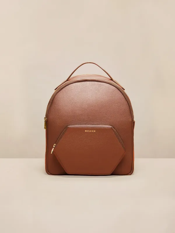 The Midi Nomad Backpack sold by BEE AND KIN