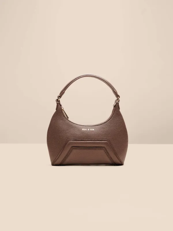 The Mini Baguette Bag sold by BEE AND KIN