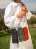The Micro Crossbody Phone Bag sold by BEE AND KIN