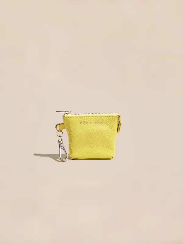 The Mini Assistant AirPods Pouch sold by BEE AND KIN