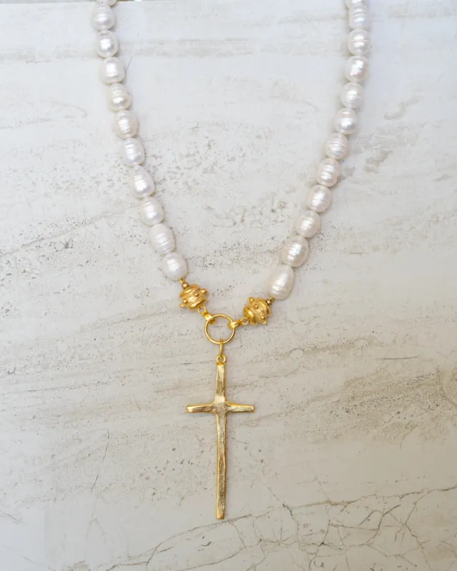Elongated Cross Pearl Necklace sold by Care Tucker